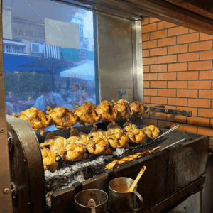 SidderUnderEnPalme - Frango Asado hos O Churrasco i Lissabon